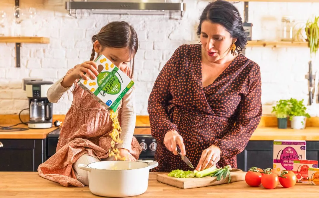 Mum and daughter are cooking